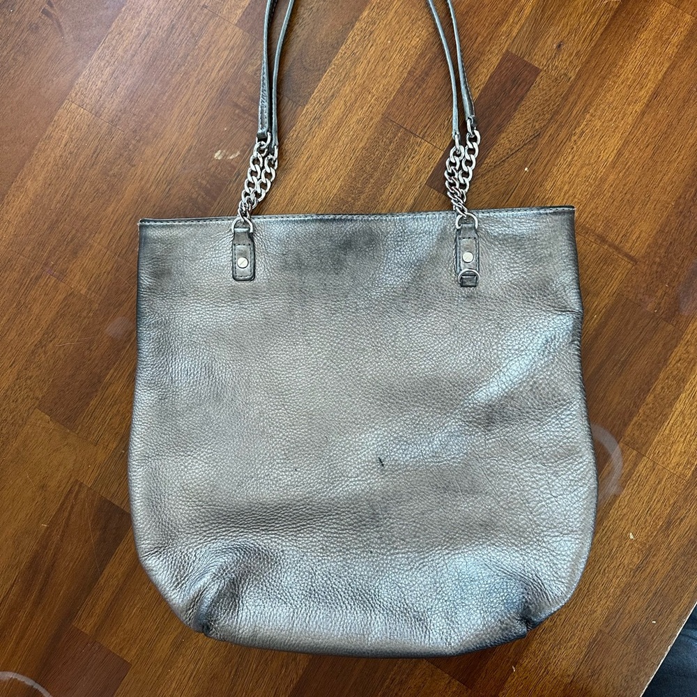 Silver metallic Michael Kors tote with drop chain handle